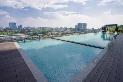 a large swimming pool on the roof of a building at Societe by fafa in Kuala Lumpur