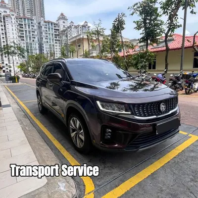 a black car parked in a parking lot at SIgnature Residence - Desa Sri Hartamas - Studio in Kuala Lumpur
