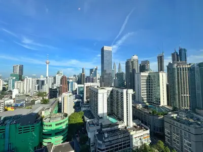 an aerial view of a city with tall buildings at Axon Bukit Bintang Cozy 1BR Suite with KLCC View in Kuala Lumpur