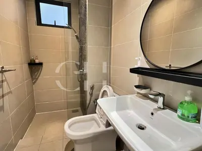a bathroom with a sink and a toilet and a mirror at KL Cheras at The Continew 5 pax in Kuala Lumpur