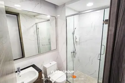 a bathroom with a shower and a toilet and a sink at Agile Bukit Bintang Premium Suites at KLCC in Kuala Lumpur