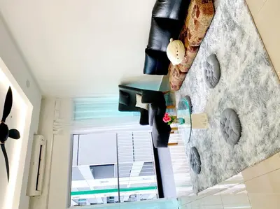 a room with a window and a rock wall at Razak City Residences dudu in Kuala Lumpur