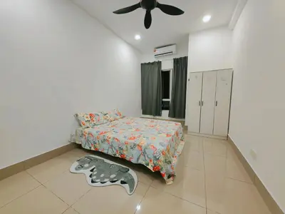 a bedroom with a bed and a ceiling fan at Razak City Residences dudu in Kuala Lumpur
