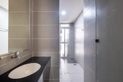 a bathroom with a sink and a mirror at Menara Arina Uniti 3km to KLCC 2BR 4Pax Mini Home in Kuala Lumpur
