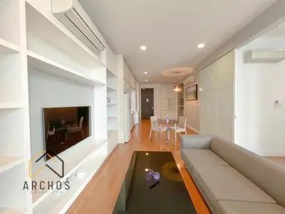 a living room with a couch and a tv at The Platinum KLCC by Archos in Kuala Lumpur