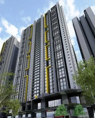a large apartment building with yellow accents on it at Backpackers Studio at Neu Suites Ampang in Kuala Lumpur
