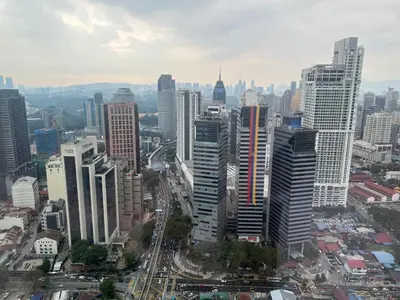 a view of a city with tall buildings at Platinum Kuala Lumpur by Sleepy Owl Suites in Kuala Lumpur