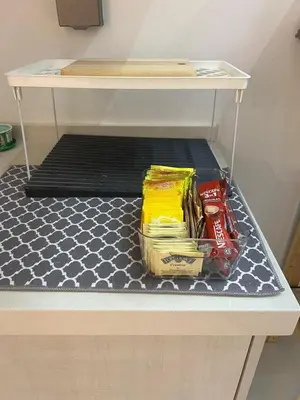 a drawer in a table with some food on it at Matt suite home in Kuala Lumpur