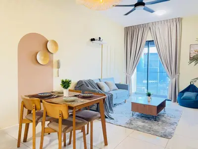 a living room with a table and a couch at KL TRX view # IKEA MRT # 2 BED 2BATH # Continew KL in Kuala Lumpur