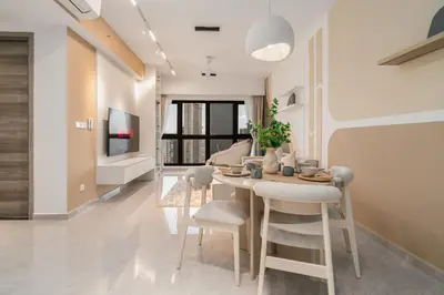 a dining room and living room with a table and chairs at Agile Bukit Bintang by KAN's in Kuala Lumpur