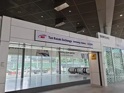 a store with a row of glass doors in a building at Agile Bukit Bintang by KAN's in Kuala Lumpur