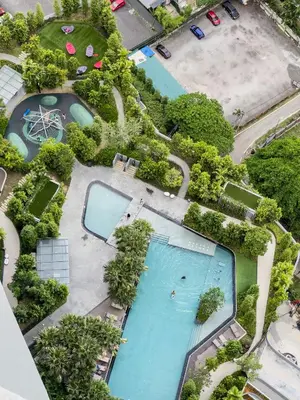 an overhead view of two swimming pools at a resort at Agile Bukit Bintang by KAN's in Kuala Lumpur