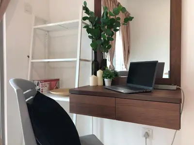 a desk with a laptop computer on top of it at Ampang 2 -3 pax Studio Ampang Point in Ampang