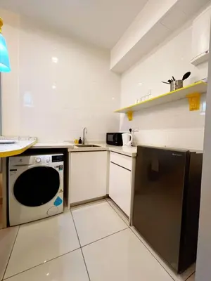 a kitchen with a sink and a dishwasher at Arte Mont Kiara 1-4 pax -MITEC-Kuala Lumpur by Infistay Homestay in Kuala Lumpur