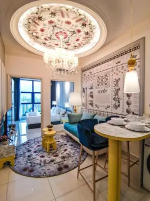 a living room with a chandelier and a dining room at Arte Mont Kiara 1-4 pax -MITEC-Kuala Lumpur by Infistay Homestay in Kuala Lumpur