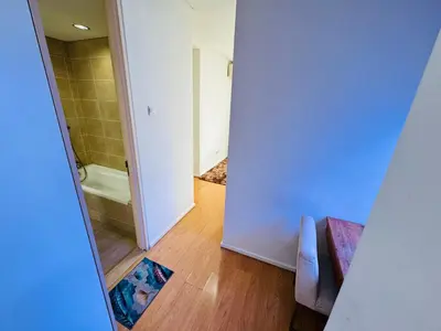 a bathroom with a shower and a tub in a room at Soha Homestay in Kuala Lumpur
