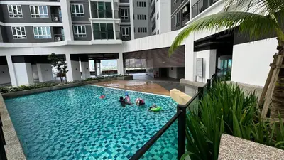 a group of people in a swimming pool in a building at MH Platinum 2 COZY Fully Air-Con Suite Kuala Lumpur in Kuala Lumpur