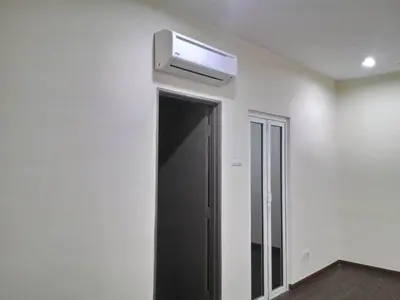 a room with a air conditioner on a wall at Zetapak homestay in Kuala Lumpur