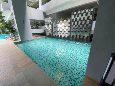 a swimming pool in the middle of a house at KL City, Neu Suites 2Bedroom 1Bathroom in Kuala Lumpur