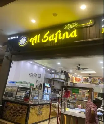 a sign on the front of a fast food restaurant at KL City, Neu Suites 2Bedroom 1Bathroom in Kuala Lumpur