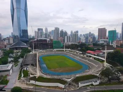 a stadium in the middle of a city at 8Pax Green View next to KL118 ChinaTown n Train Station in Kuala Lumpur