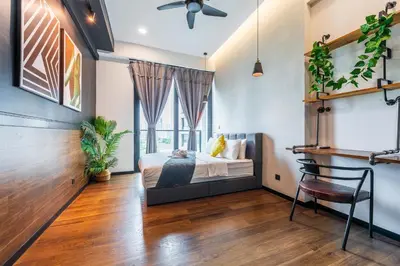 a bedroom with a bed and a window at 6pax 2BR KL118 View 5min to train Station in Kuala Lumpur
