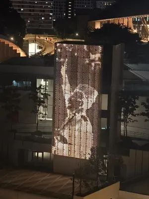 a lit up sculpture of a dog on a building at 6pax 2BR KL118 View 5min to train Station in Kuala Lumpur