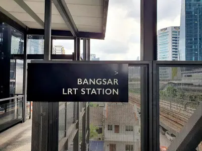a sign on the gate of a train station at The Establisment KL Sentral by GBS in Kuala Lumpur
