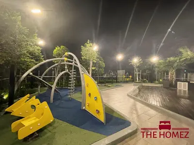 a playground at a park at night at Alfa Bangsar by The Homez in Kuala Lumpur