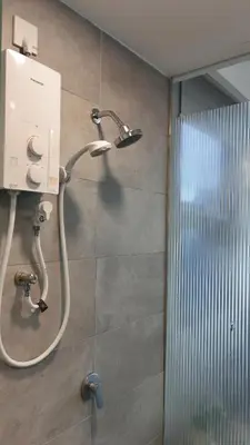 a shower in a bathroom with a shower head at Riveria City, Kl Sentral Studio Apartment near Monorail, Infinity Pool in Kuala Lumpur