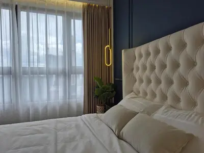 a bedroom with a white bed with a large window at Comfort Luxury Studio Kuala Lumpur Free Netflix #S3 in Kuala Lumpur