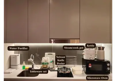 a kitchen counter with a sink and a coffee maker at Design House Kuala Lumpur #P3 in Kuala Lumpur