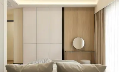a bedroom with a bed and a mirror at Core Residence at TRX by LL in Kuala Lumpur