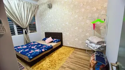 a small bedroom with a bed and a window at AS Homes Kuala Lumpur in Kuala Lumpur