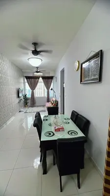 a dining room with a table and chairs at AS Homes Kuala Lumpur in Kuala Lumpur