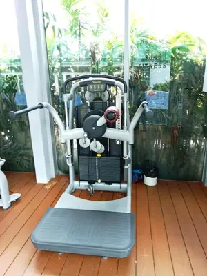 an exercise machine sitting on a wooden floor at Vortex Suites KLCC By Farysha in Kuala Lumpur