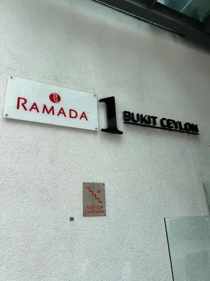 a sign that says ramada and just condos on a wall at Nice & convenient Studio in KL in Kuala Lumpur