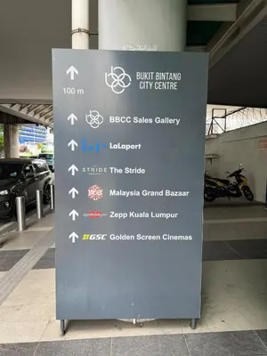 a sign in front of a parking garage at Near Jalan Alor in Kuala Lumpur