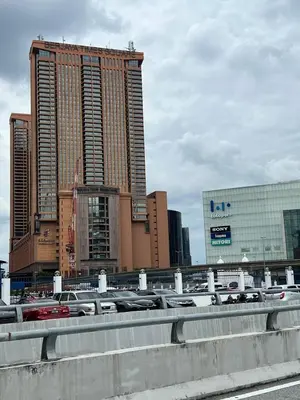 a bunch of cars parked in front of some buildings at Near Jalan Alor in Kuala Lumpur