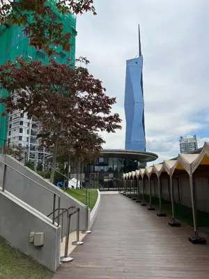 a walkway with a statue of a building in the background at Comfy place near Bukit in Kuala Lumpur