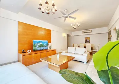 a living room with a couch and a table at Fahrenheit #185 Kuala Lumpur Bukit Bintang in Kuala Lumpur