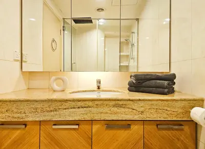 a bathroom with a sink and a mirror at Fahrenheit #185 Kuala Lumpur Bukit Bintang in Kuala Lumpur