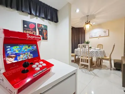 a red video game machine sitting on top of a counter at Bukit Bintang Fahrenheit #113 KLCC Kuala Lumpur in Kuala Lumpur