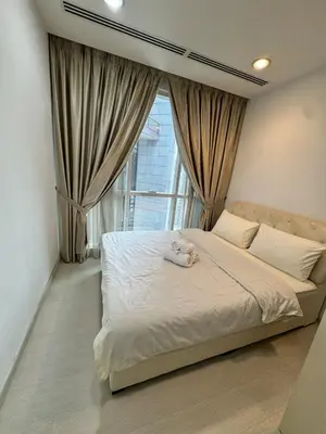 a bed in a room with a large window at Great Value City Center Unit in Kuala Lumpur