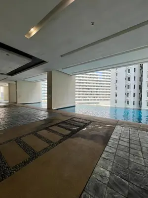 a large room with a swimming pool in a building at Great Value City Center Unit in Kuala Lumpur