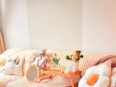 a living room with a couch with a mirror and a table at Perfect for Families & Larger Groups, KL MRT- M Vertica in Kuala Lumpur
