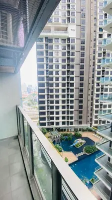 a view from the balcony of a large building at Mercu Summer Suites near KLCC in Kuala Lumpur