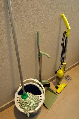 a bowl with a mop in it on the floor at 9 Pax 3R3B Trion KL City View 10Mins to KLCC in Kuala Lumpur