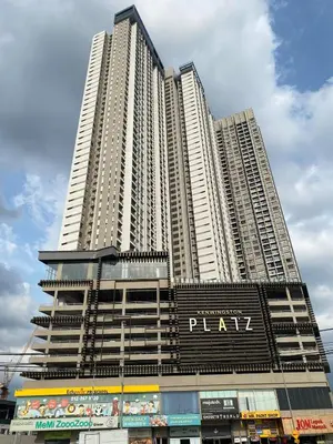 a tall building with a sign in front of it at Cozy Kenwingston Platz KL 2-5 Pax 2BR & 2BR FrePakin Netflix 2802 in Kuala Lumpur