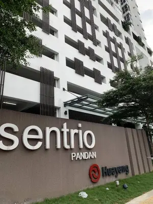 a sign for the santina pajani headquarters at Sentrio Pandan Kuala Lumpur KLCC KL Tower TRX 10 in Kuala Lumpur